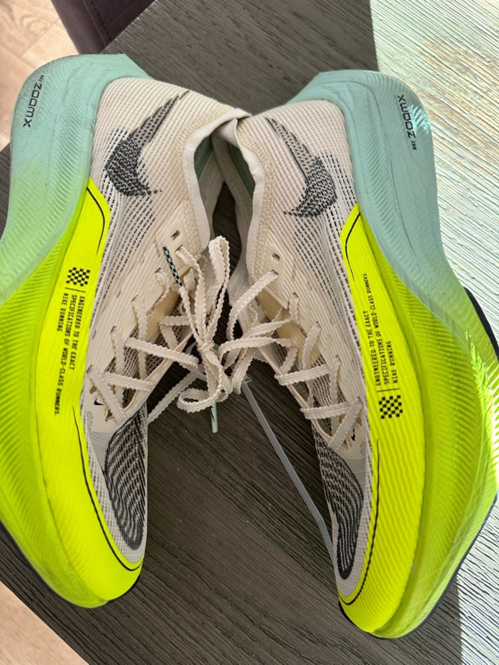 Nike ZoomX Vaporfly NEXT% 2 white, and neon